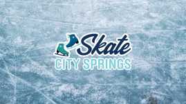 Skate City Springs logo on top of ice of a skating rink
