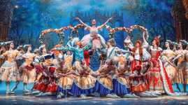 Triumphant Princess Aurora being held high by other dancers