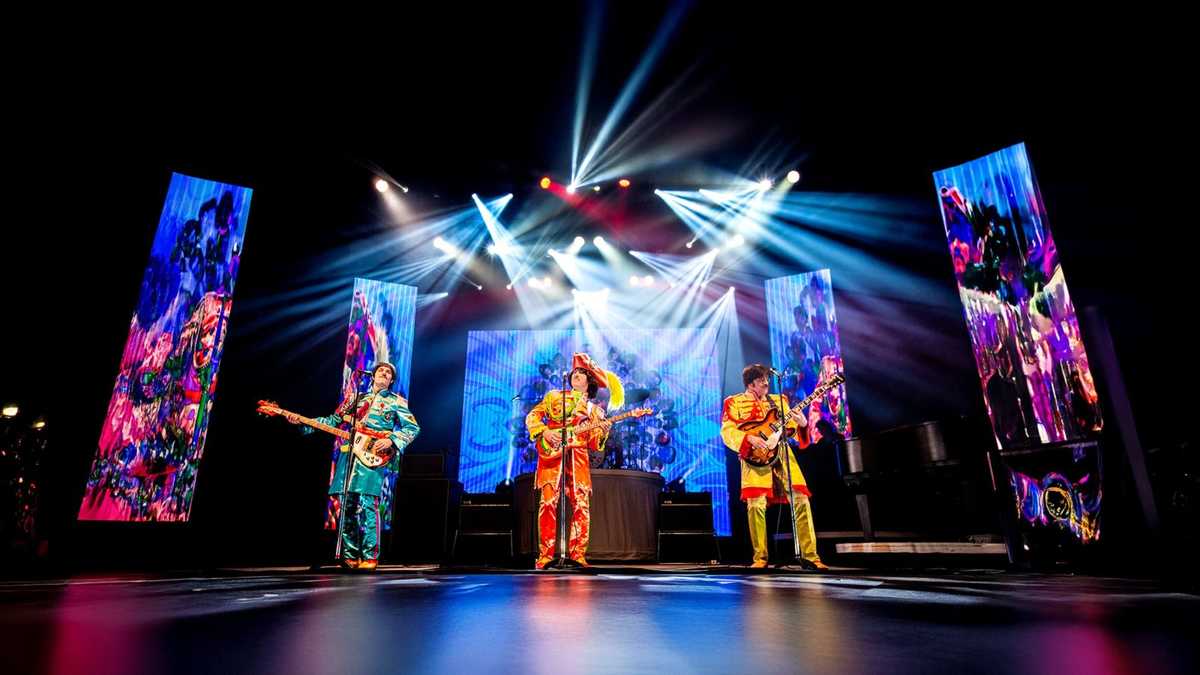 Rain: A Beatles Christmas Tribute on stage 