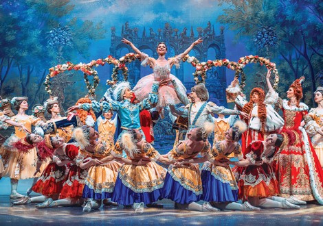 Triumphant Princess Aurora being held high by other dancers