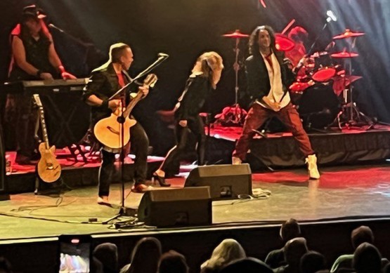 Broadway's Rock of Ages Band performing on stage