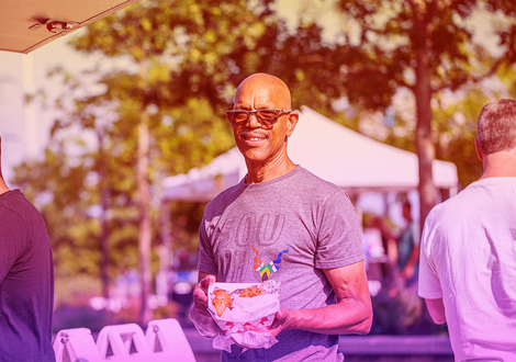A man enjoys Smalls Big Taste at Sundown Social 