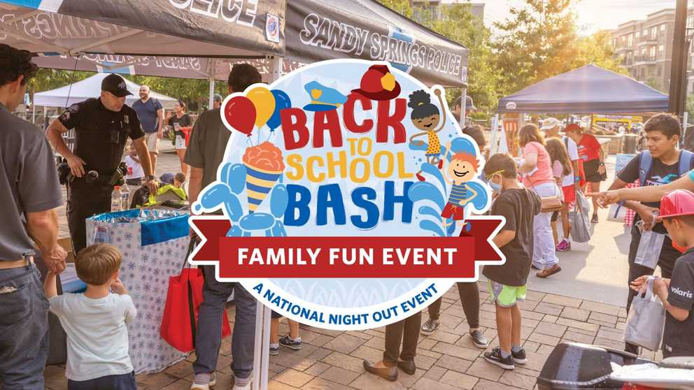 Back to School Bash emblem features children playing in the splashpad, snow cone, balloon animal, and a police & fire hat.