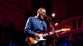 Robert Cray playing the guitar